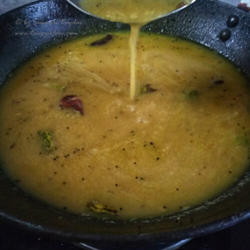 simmering tok dal on flame