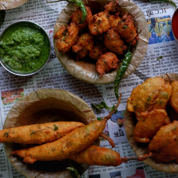 Fritters served on recyclable cups to be enjoyed in monsoon