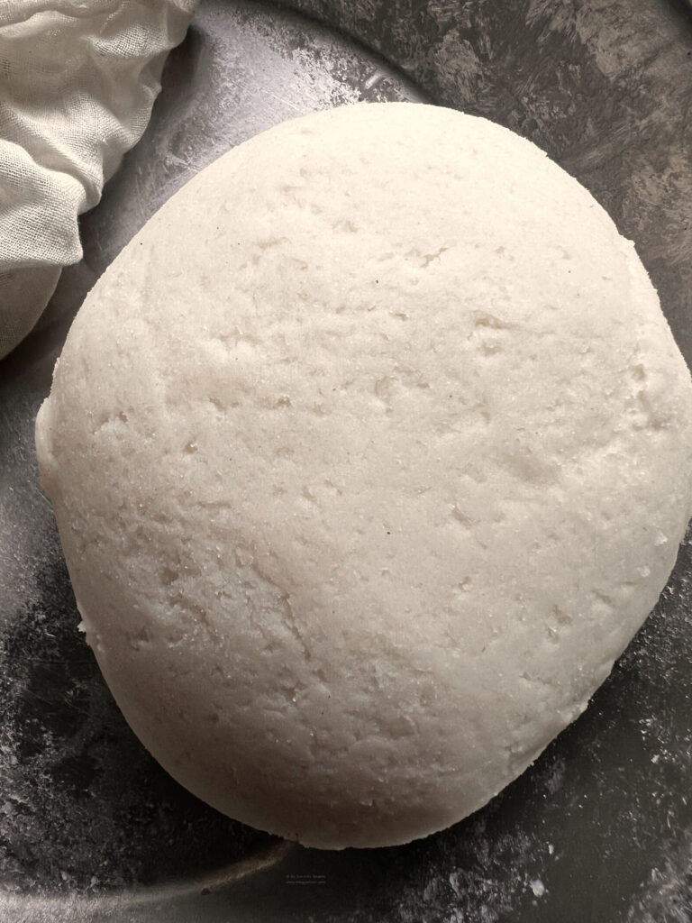 rice flour dough on steel plate with with cotton cloth on side
