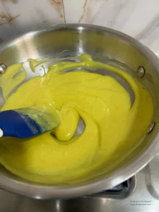 Undercooked khandvi batter in a pan